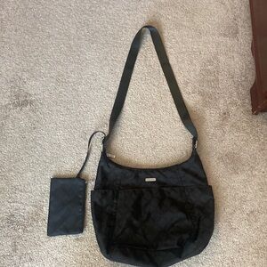 Baggallini hobo purse with matching wristlet. EUC